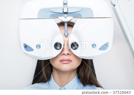 patient, vision test with phoropter 37520843