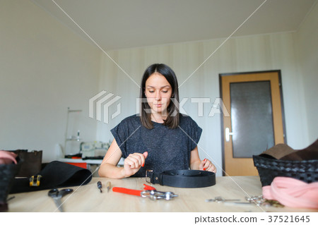 Sales manager making list of produced bags. 37521645