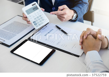 Businessman being analysis and making the decision a car insuran Businessman being analysis and making the decision a car insuran 37522759