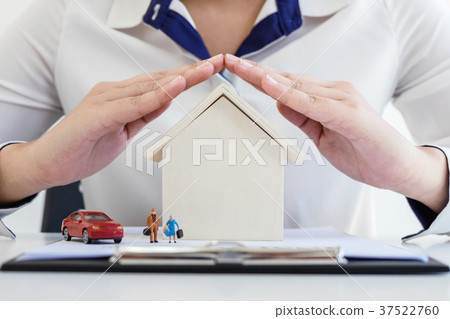 insurance and care protection of house family concept, woman wit insurance and care protection of house family concept, woman wit 37522760