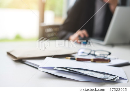 Bribery and corruption concept, bribe in the form of dollar bill Bribery and corruption concept, bribe in the form of dollar bill 37522925
