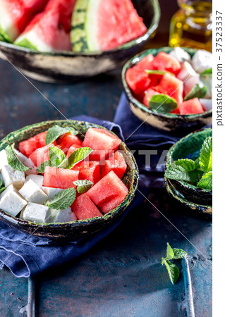 Watermelon cheese and mint salad with olive oil Watermelon cheese and mint salad with olive oil 37523337