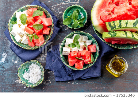 Watermelon cheese and mint salad with olive oil 37523340