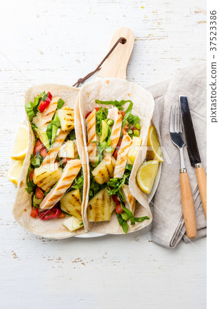 Mexican chicken tacos with grilled pineapple on 37523386