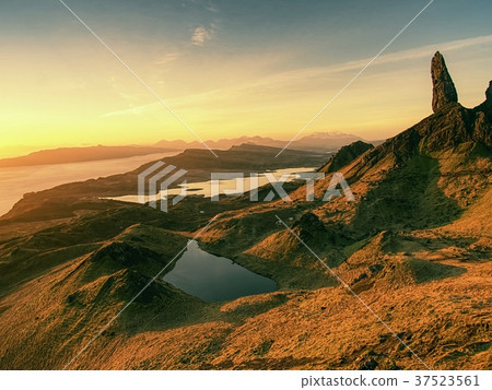 Famous exposed rocks Old Man of Storr, north hill 37523561
