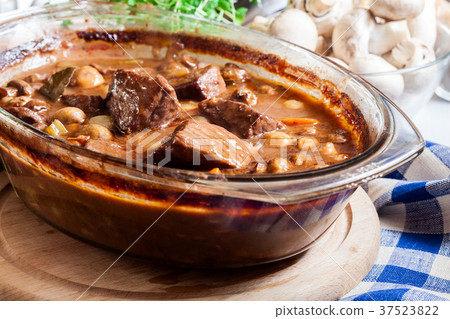 Beef Bourguignon stew in a casserole dish Beef Bourguignon stew in a casserole dish 37523822