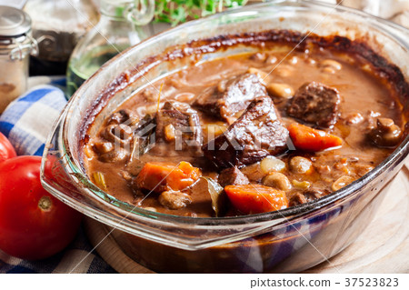 Beef Bourguignon stew in a casserole dish Beef Bourguignon stew in a casserole dish 37523823