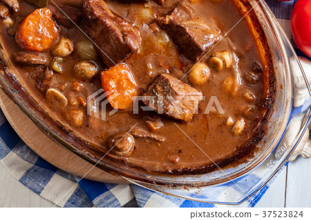 Beef Bourguignon stew in a casserole dish Beef Bourguignon stew in a casserole dish 37523824