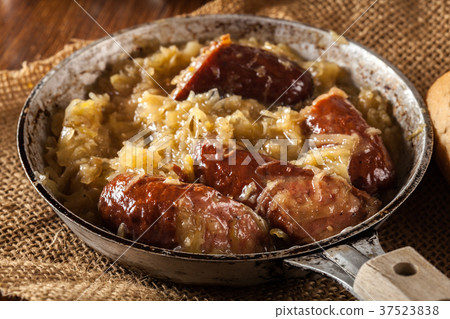 Sauerkraut braised with sausages Sauerkraut braised with sausages 37523838