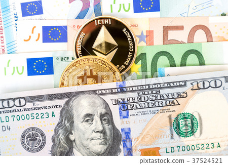 Cryptocurrency coins lying on the dollar and euro Cryptocurrency coins lying on the dollar and euro 37524521
