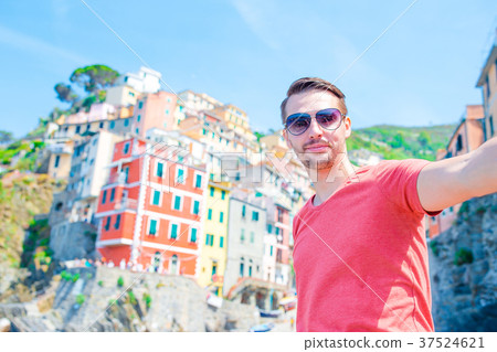 Young man taking selfie with beautiful view at old Young man taking selfie with beautiful view at old 37524621