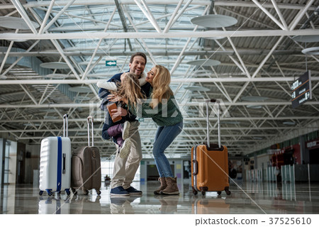 Loving mom and dad are happy seeing their kid 37525610