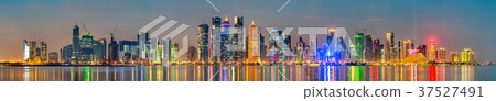 Skyline of Doha at sunset. The capital of Qatar Skyline of Doha at sunset. The capital of Qatar 37527491