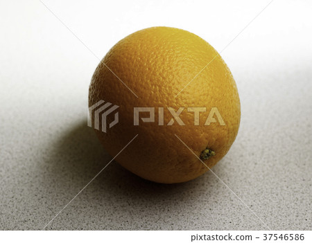 Whole orange on light background 37546586