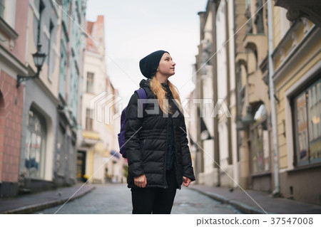 portrait of teen girl walking in Old Tallinn in portrait of teen girl walking in Old Tallinn in 37547008