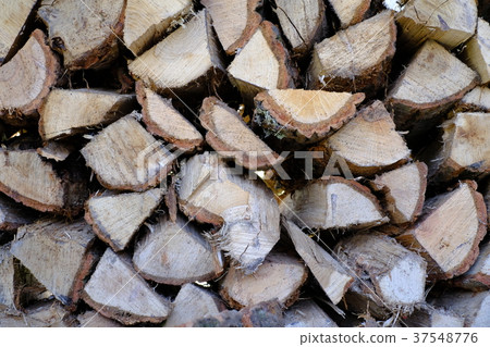 Lots of piled firewood Lots of piled firewood 37548776