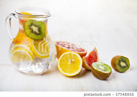 Refreshing ice cold water with lemon Refreshing ice cold water with lemon 37548938