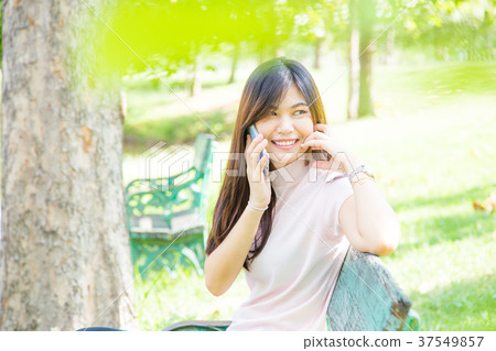 woman using on the smart phone with feeling rela 37549857