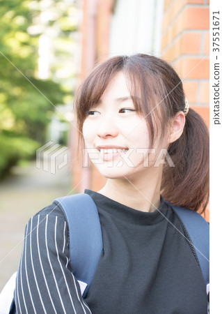 Women walking on campus (Japan Economic University) Women walking on campus (Japan Economic University) 37551671