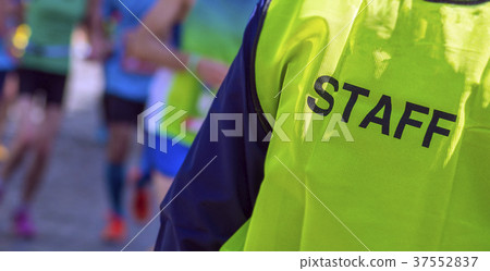 bib staff service working during a marathon bib staff service working during a marathon 37552837