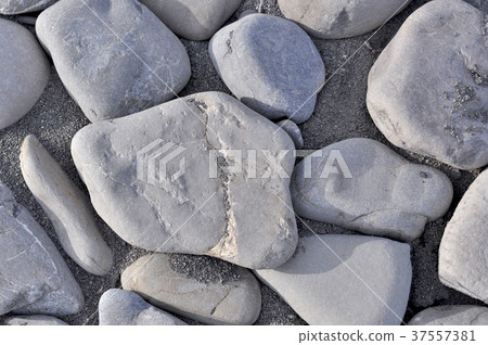 Small sea stones, gravel. Background Small sea stones, gravel. Background 37557381
