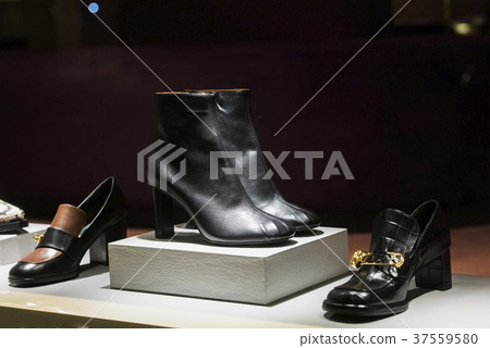 Elegant boots in a store in Milan 37559580