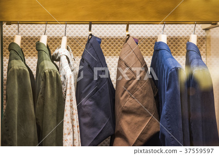Pants and shirts in a store in Milan. 37559597