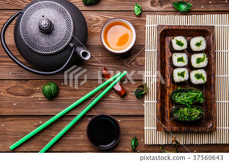 Wooden surface with rolls, sticks 37560643