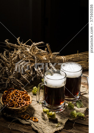 Two tankard beer with wheat and hops , basket of Two tankard beer with wheat and hops , basket of 37560886