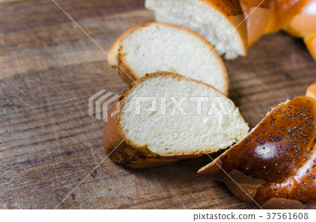 Wicker homemade bread. Sweet wheat sliced bun. 37561608