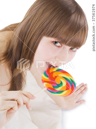 Bright picture of happy blonde with color lollipop Bright picture of happy blonde with color lollipop 37561974