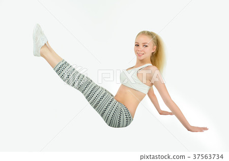 Fit woman stretching her leg to warm up 37563734