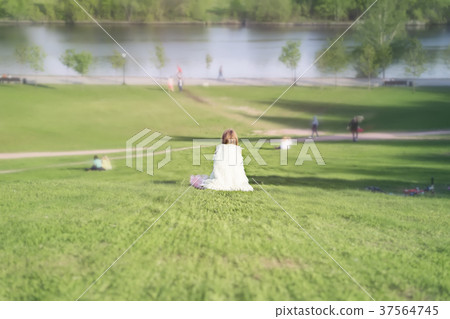 Girl, in her clothes looking like on a white an Girl, in her clothes looking like on a white an 37564745