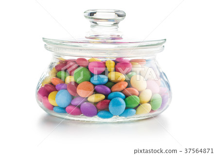 Colorful chocolate candies in jar. 37564871