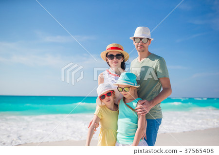 Parents and kids on beach vacation. Closeup of 37565408