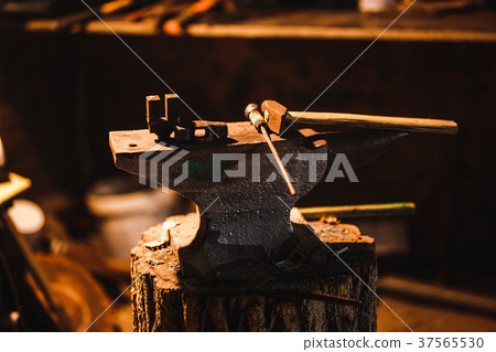 Hand anvil. Tools in old blacksmith shop Hand anvil. Tools in old blacksmith shop 37565530