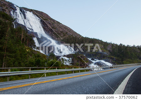 Summer mountain Langfossen waterfall on slope Etne 37570062