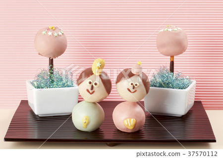 Candy doll made of sweets 37570112