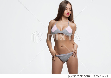 Young beautiful girl shows her gorgeous Breasts Young beautiful girl shows her gorgeous Breasts 37573221