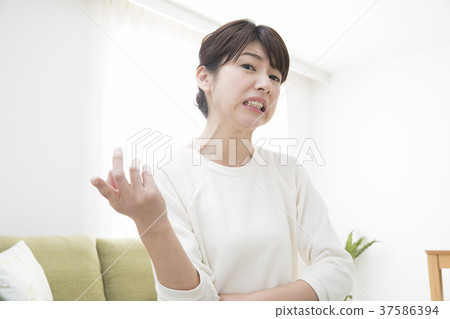 An angry woman An angry woman 37586394