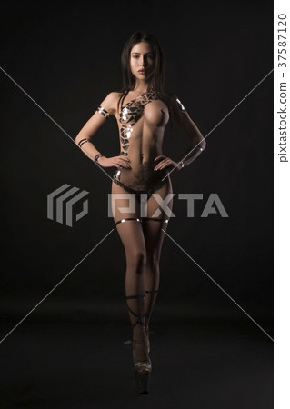 Nude girl her body covered with gold tape 37587120