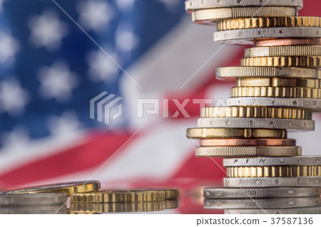 National flag of america and euro coins - concept. 37587136