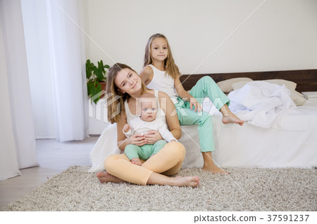 three girls play sisters in the morning in the 37591237