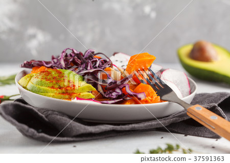 salad of baked beets, sweet potato and avocado 37591363