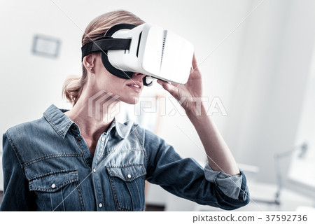 Portrait of serious woman that testing mask 37592736