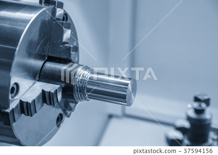 The  CNC lathe machine . 37594156