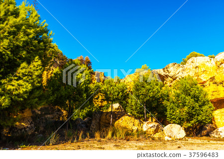great rock wall, cliff against the blue sky great rock wall, cliff against the blue sky 37596483