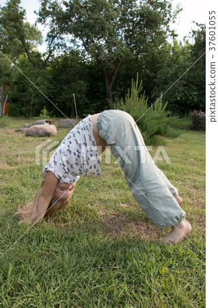 little beautiful girl doing yoga in the park little beautiful girl doing yoga in the park 37601055