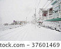 Snow-covered road  37601469