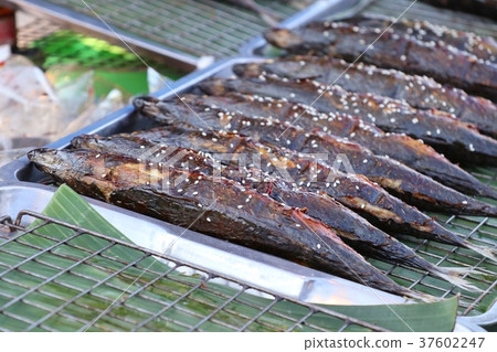 Grilled fish at the market Grilled fish at the market 37602247